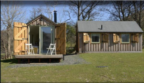 Secluded Beckside Cabins at the edge of Ullswater Lake